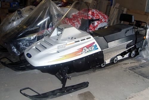 Фотография моторизованного эвакуатора. Снегоход Lynx 500 в белом цвете